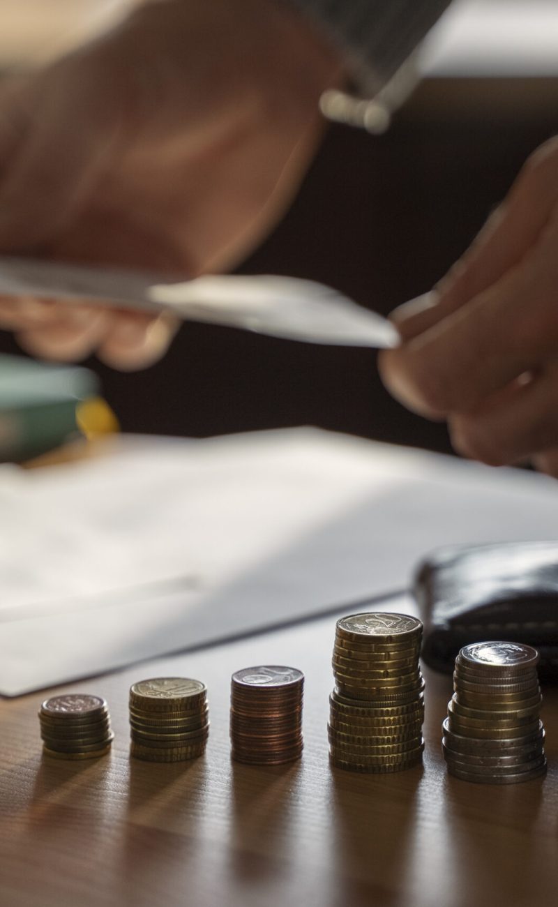 close up coins saved energy crisis expenses